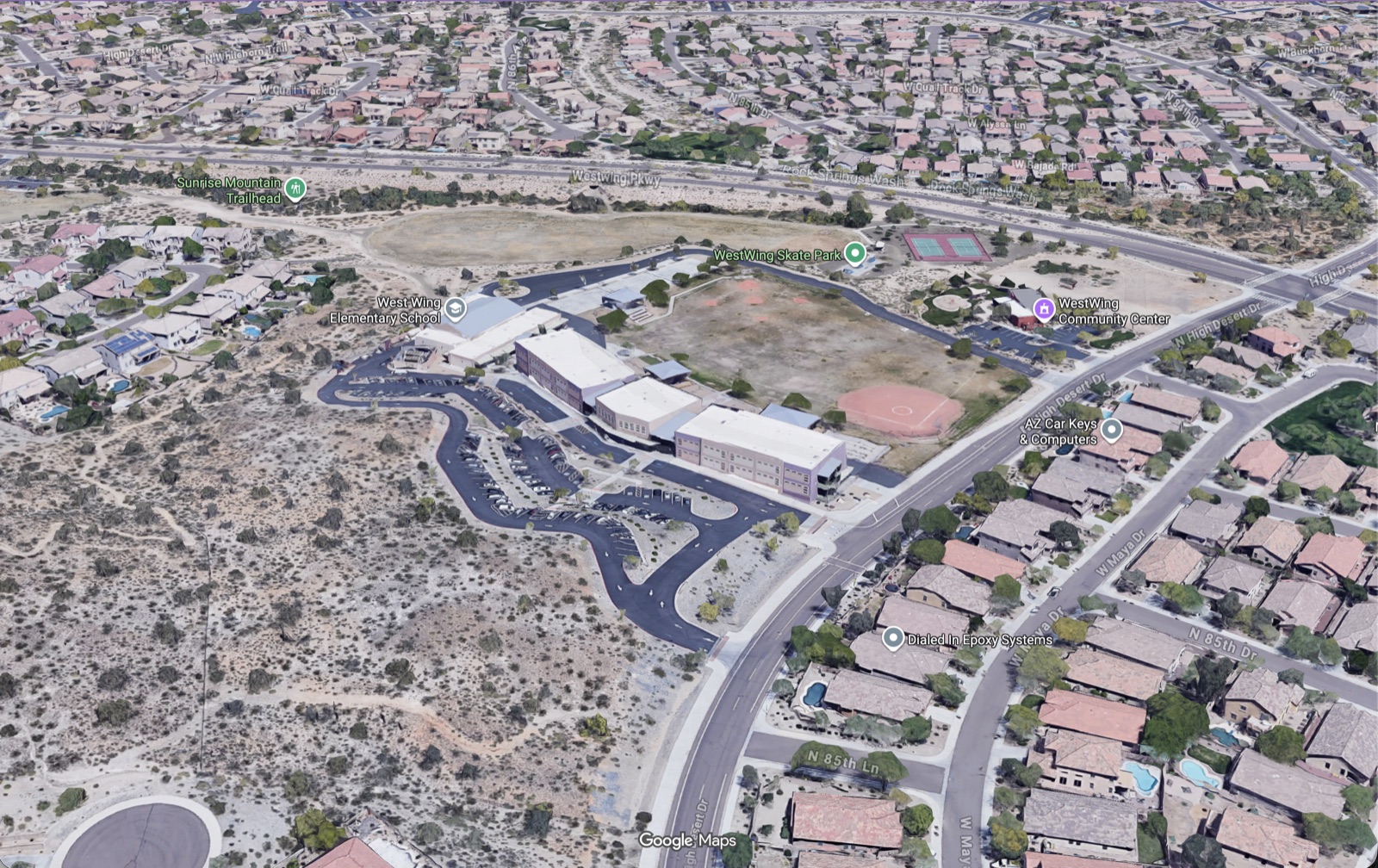 Aerial view showing West Wing Elementary School in the surrounding neighborhood near West Wing Parkway